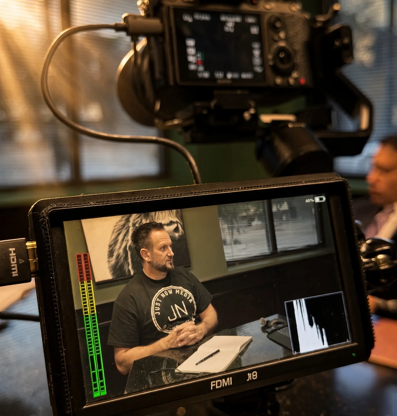 Production monitor showing Mike Grimm during an interview